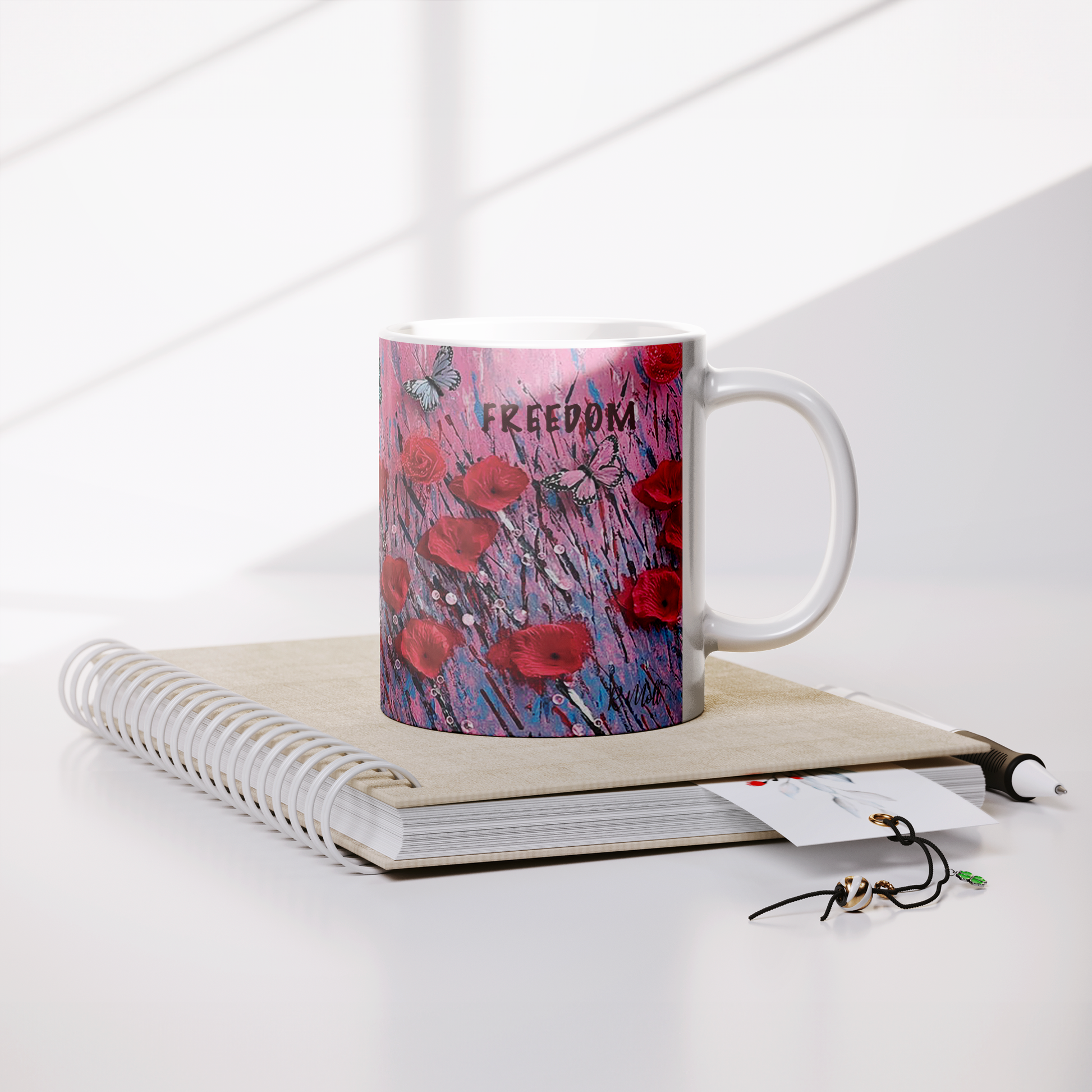 Freedom_-_Poppies_Mug_Lifestyle_Notebook_Mockup.png